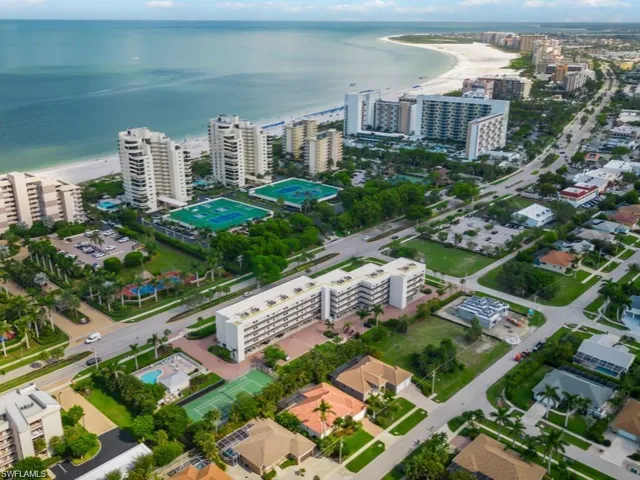 View of urban area featuring expansive beach