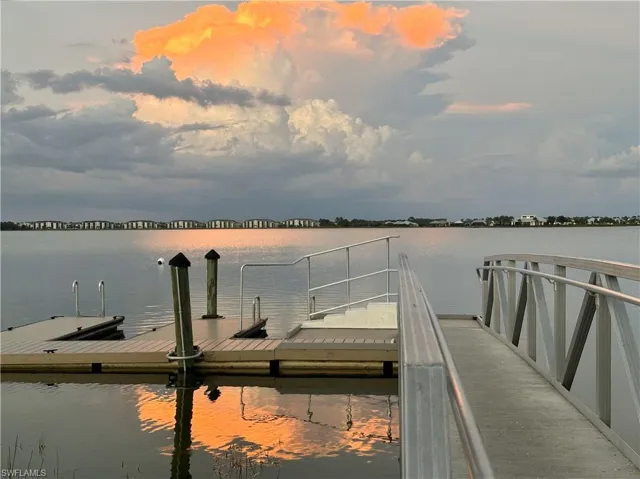 Dock featuring a water view