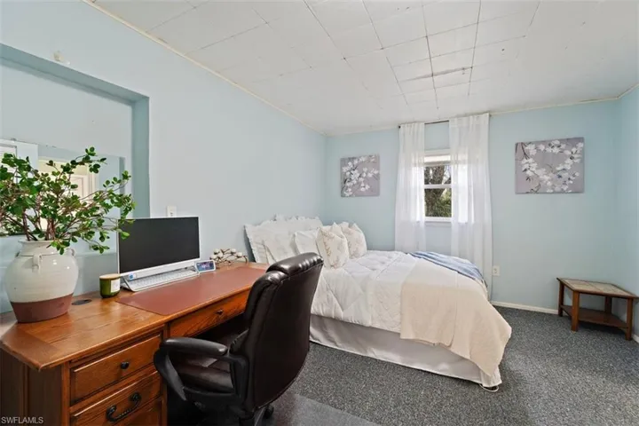 Bedroom featuring carpet floors