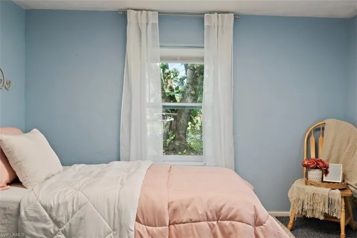 Bedroom with carpet