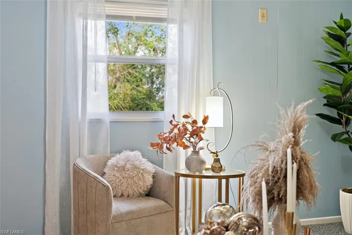 Living area featuring carpet flooring