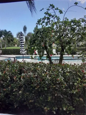 View of yard featuring a community pool