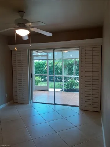 light tile floors and plantation shutters, view of lanai