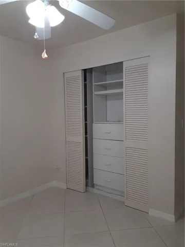 Contemporary closet organization in second bedroom
