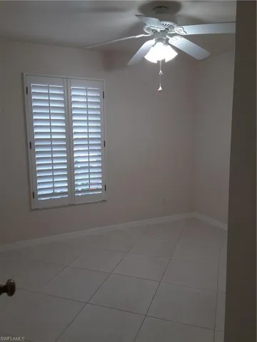 (Now unfurnished) Light tile and plantation shutters
