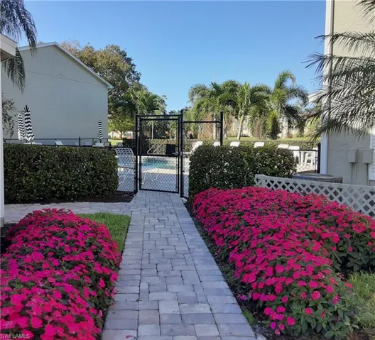 Walkway to Pool next to Condominium