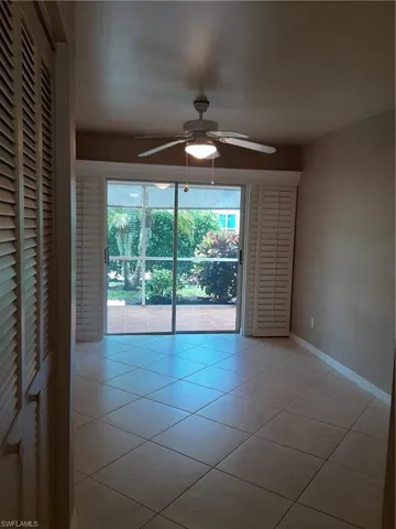 (now unfurnished) Light tile floors and plantation shutters