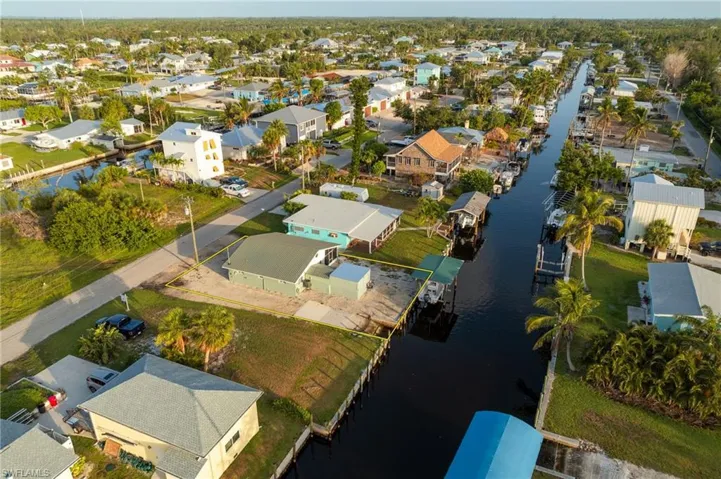 Aerial view of residential area with a large body of water