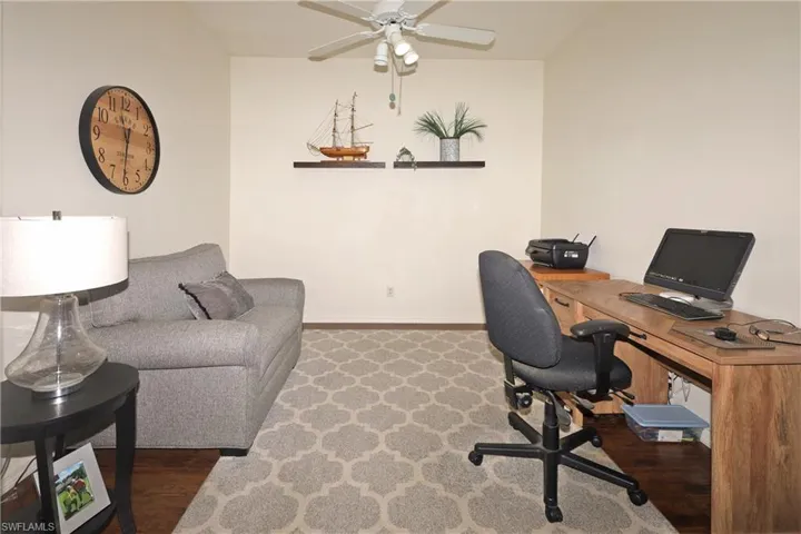 Den/office with ceiling fan