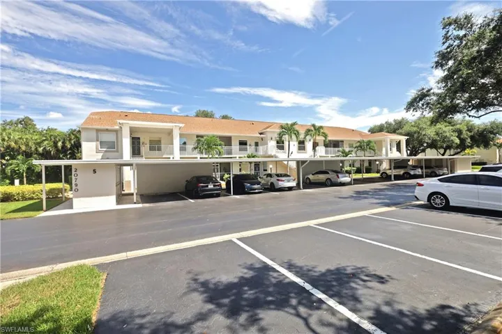 View of parking with carport