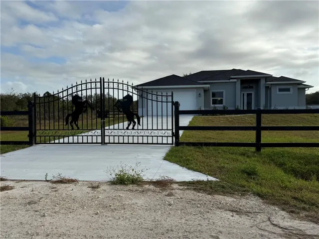 Gate with a fenced front yard