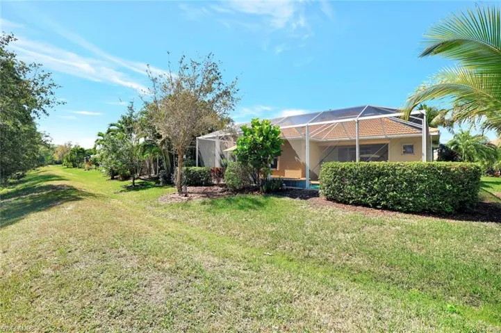View of yard featuring a lanai