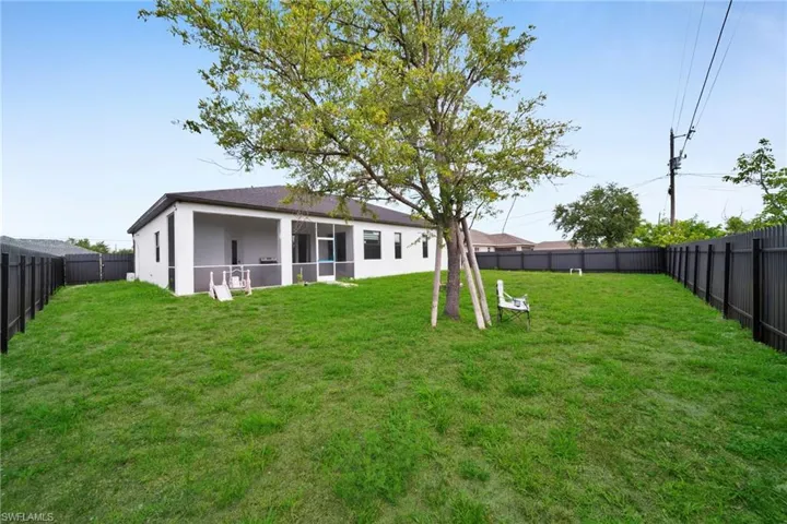 Back of property with stucco siding