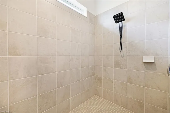 Bathroom with a tile shower