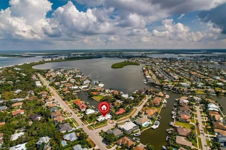 Aerial view featuring a water view