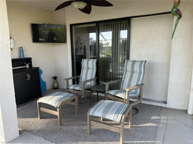 View of patio / terrace featuring a ceiling fan