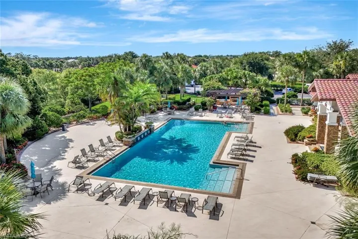 Community pool featuring a patio area