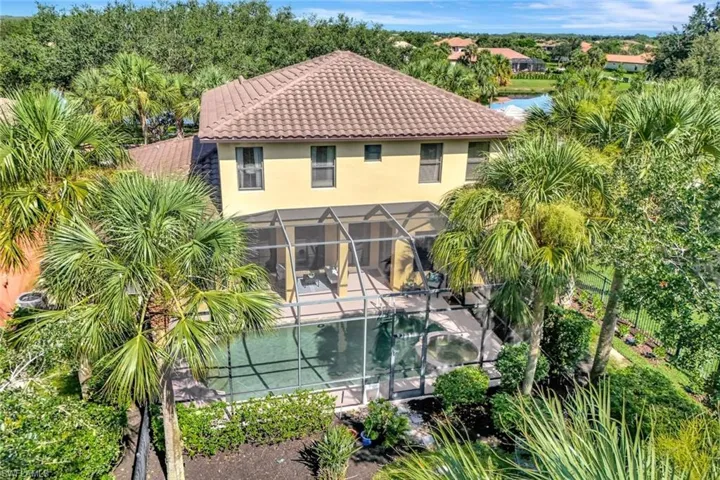 Outdoor pool featuring a patio area and a lanai
