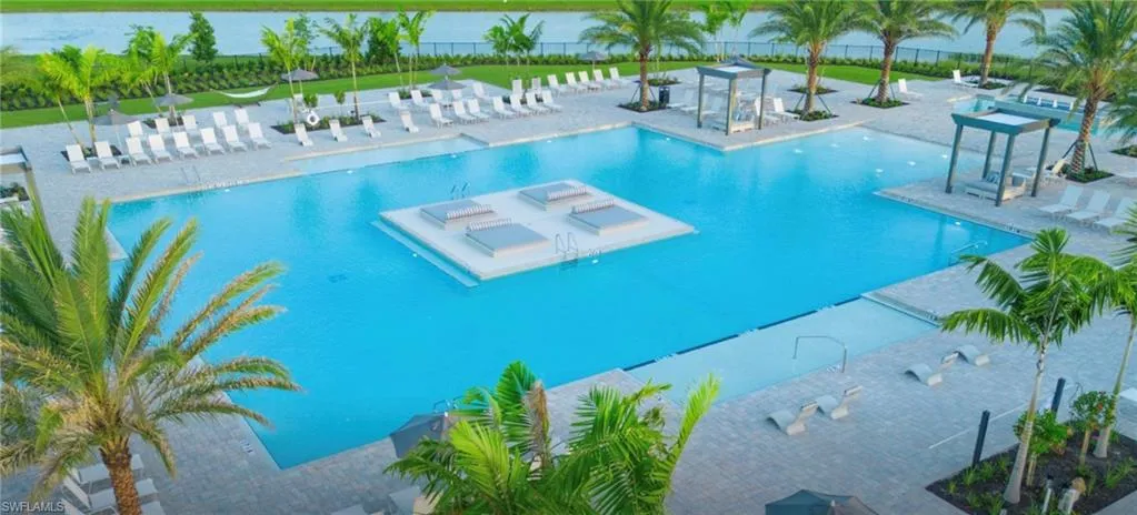 Community pool with a patio area