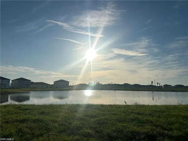 Water view with nearby suburban area