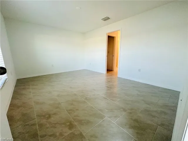 Empty room with baseboards