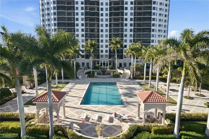 Community pool with a patio area