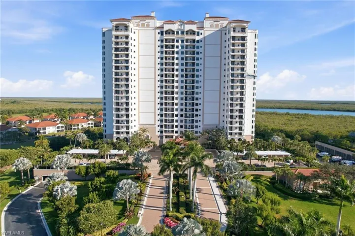 View of apartment building / complex with a water view