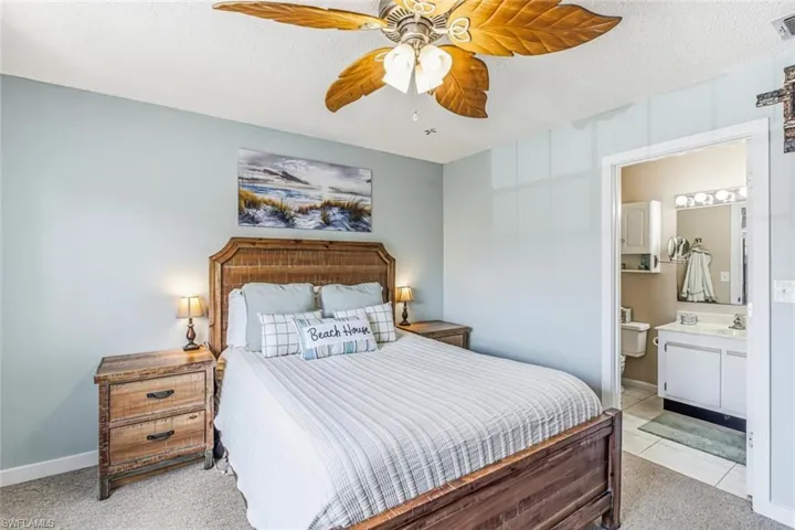 Textured wood-finish bed frame and headboard with coordinating nightstands