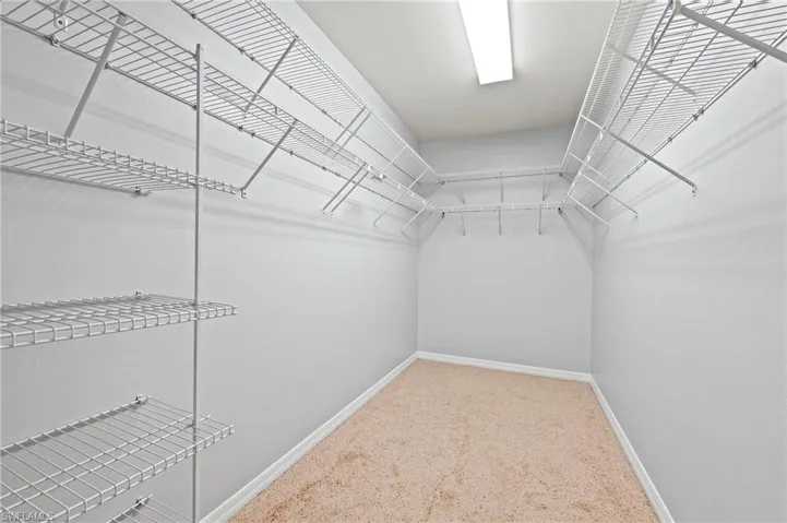 28462 Villagewalk Blvd Bonita Springs FL 34135 - Walk in closet in second floor bedroom