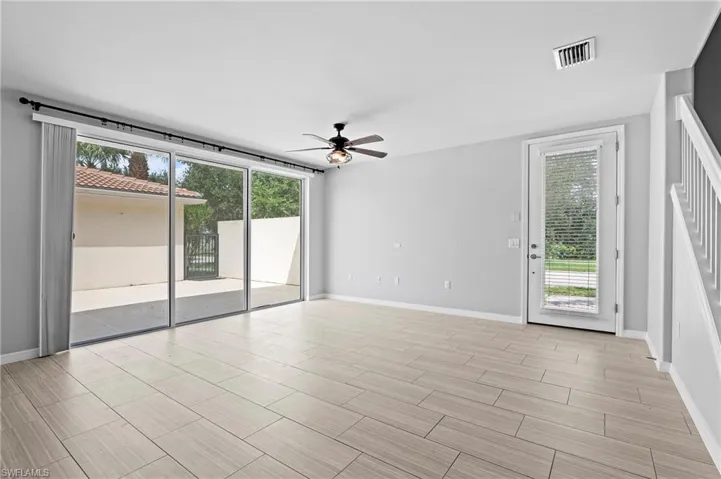 28462 Villagewalk Blvd Bonita Springs FL 34135 - Pull across slider window treatment and blinds give you privacy when you want it.