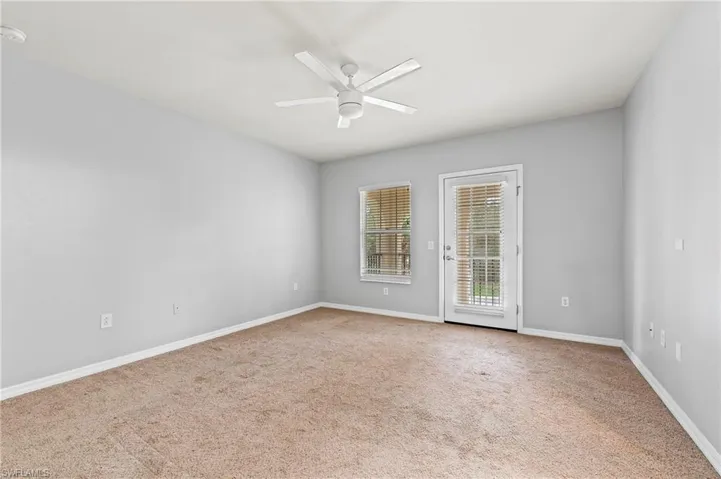28462 Villagewalk Blvd Bonita Springs FL 34135 - Primary bedroom with balcony