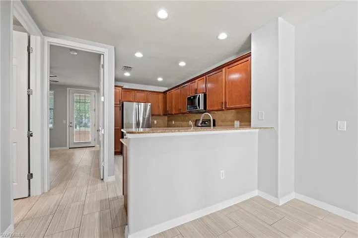 28462 Villagewalk Blvd Bonita Springs FL 34135 - Stainless and granite kitchen
