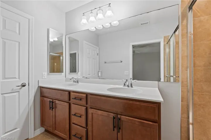 28462 Villagewalk Blvd Bonita Springs FL 34135 - Owner's bathroom with private commode, dual sinks and shower