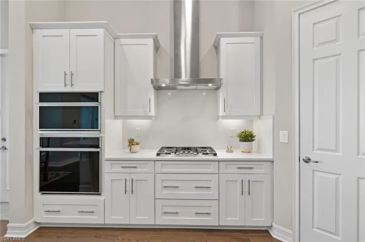 Built in kitchen with gas range and upgraded appliances