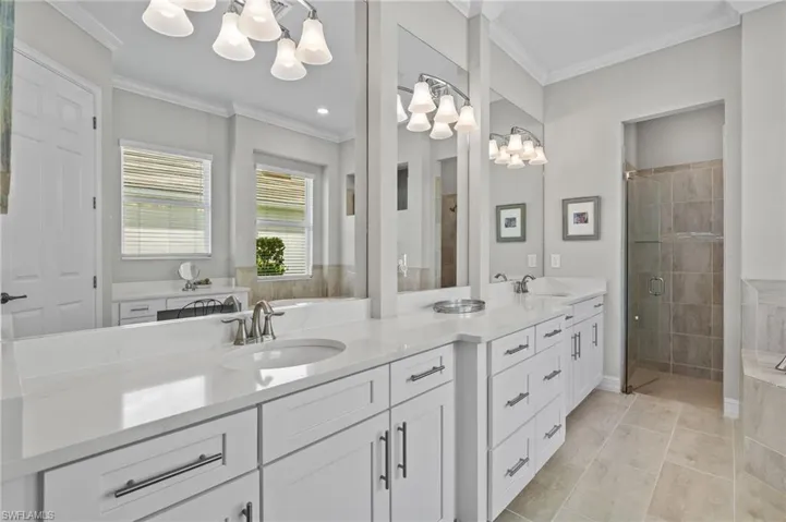 Spa like primary bathroom, double sinks, soaker tub and dual head walk in shower