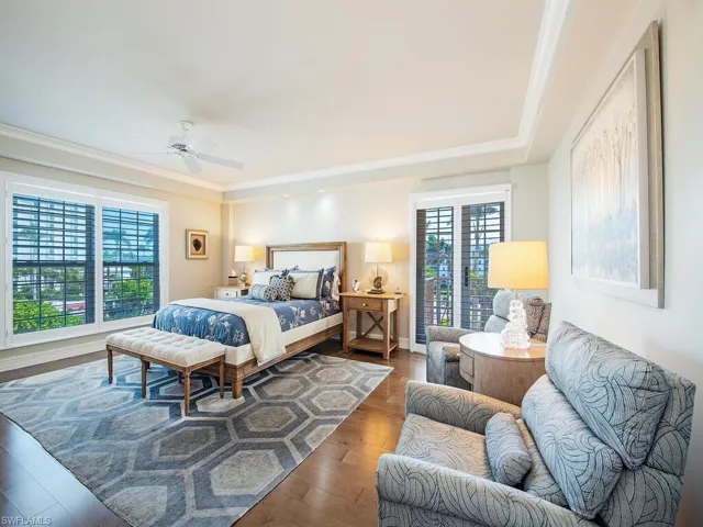 Master bedroom with sitting area and Eastern balcony