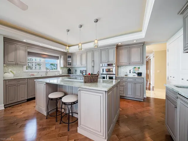 Spacious island kitchen with breakfast bar and extra storage