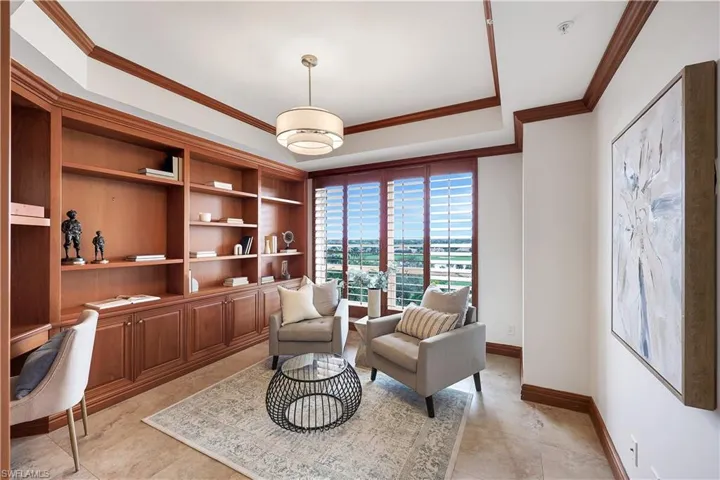 This den which is used as an office and sitting room can easliy accommodate a pullout sofa sleeper for extra guests.