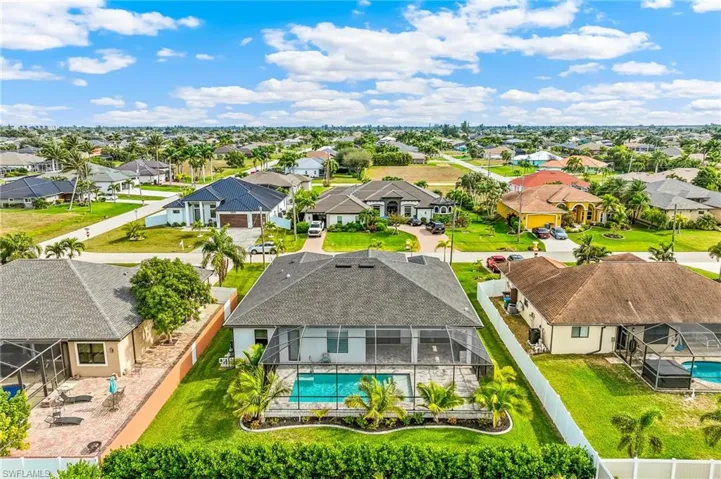 Aerial view of residential area with a pool