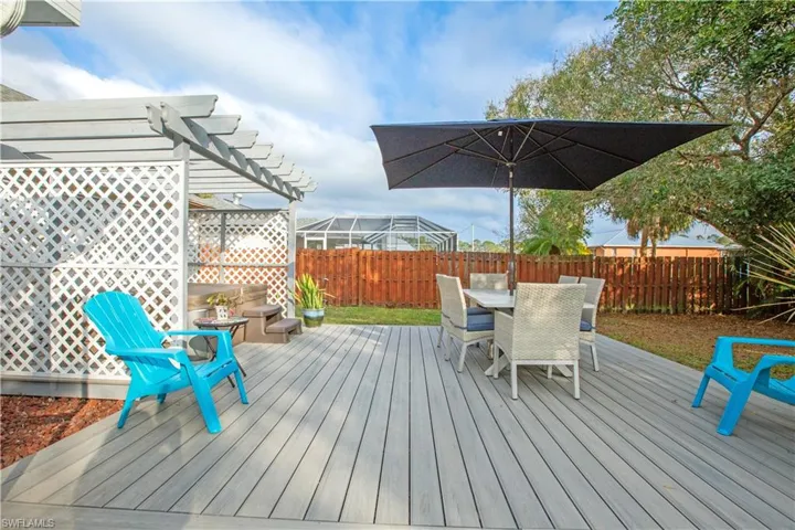 Wooden terrace with a pergola