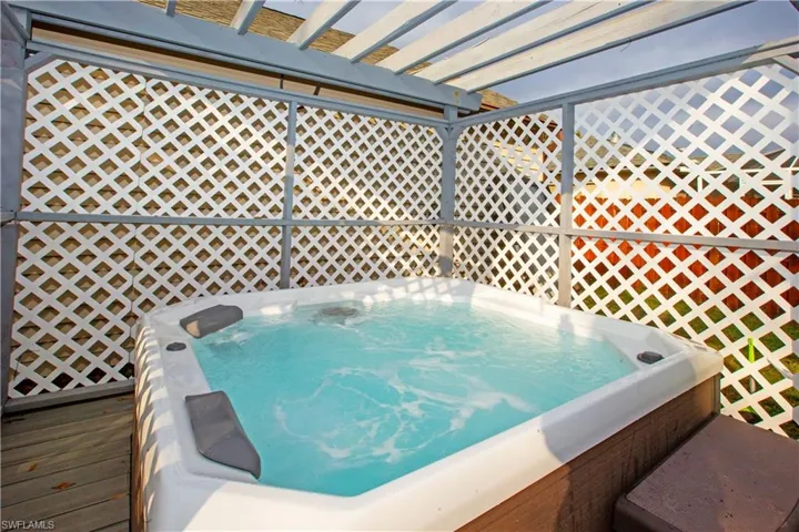 Deck featuring a hot tub