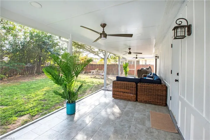View of patio / terrace featuring an outdoor living space and ceiling fan