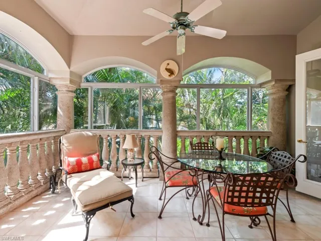 Sunroom / solarium featuring tile patterned flooring