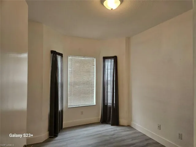 Unfurnished room featuring light hardwood / wood-style floors