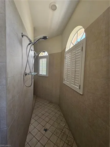 Bathroom with a tile shower