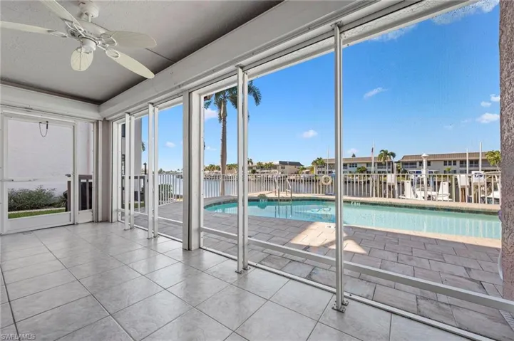 Screened lanai with electric shutters