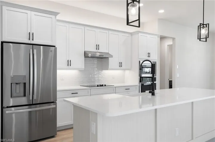 Wall Oven and cooktop with gorgeous backsplash