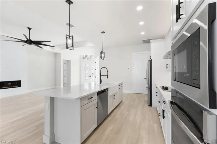 check out the Wall fire place and woodgrained tile flooring!
