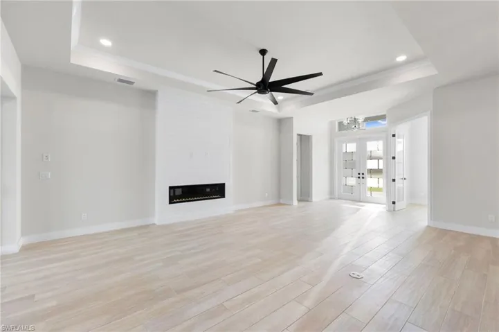 Media wall and entryway, notice the inset electric point in the floor for your lighting needs.