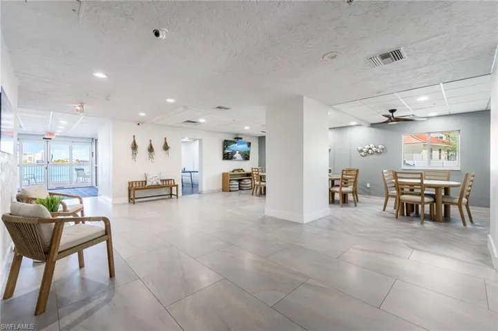 Spacious community room with coastal décor